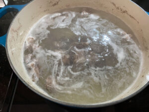 Boiling the Chopped Turtle Meat
