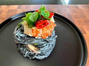Recipe for Lobster Tonnarelli al Nero with Mushrooms in Garlic Alfredo Sauce