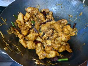 The Fried Chicken Gets Mixed In with the Sauce for General Tso's Chicken
